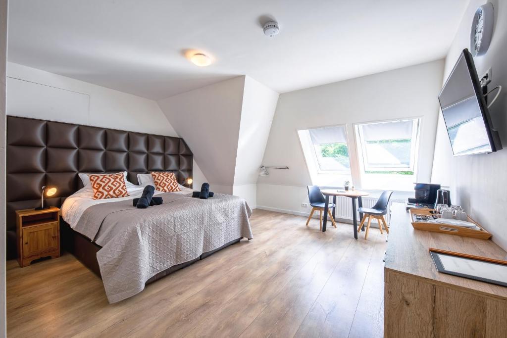 TV a/nebo společenská místnost v ubytování Theislandlife Texel B&B - Wellness, sauna, jacuzzi, massage