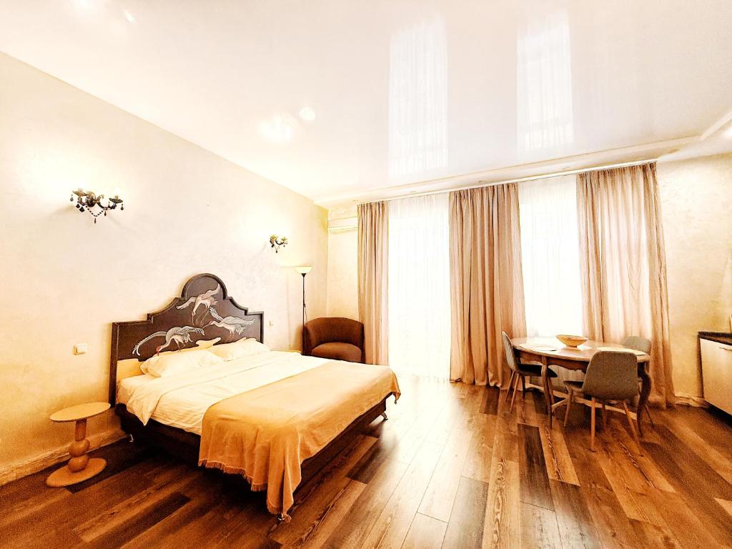 Postel nebo postele na pokoji v ubytování Kyiv Panna Apartment