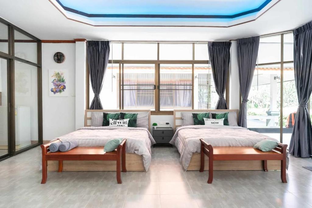 Postel nebo postele na pokoji v ubytování Sun Moon Tree Resort & Recreation