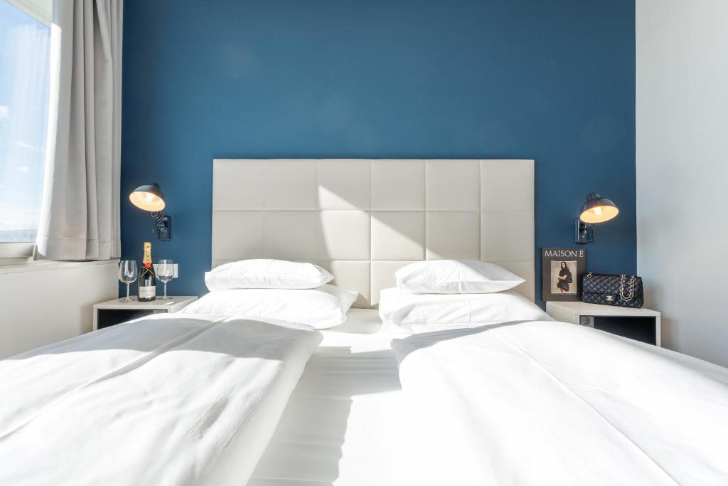 Postel nebo postele na pokoji v ubytování Vienna Skyline Apartment