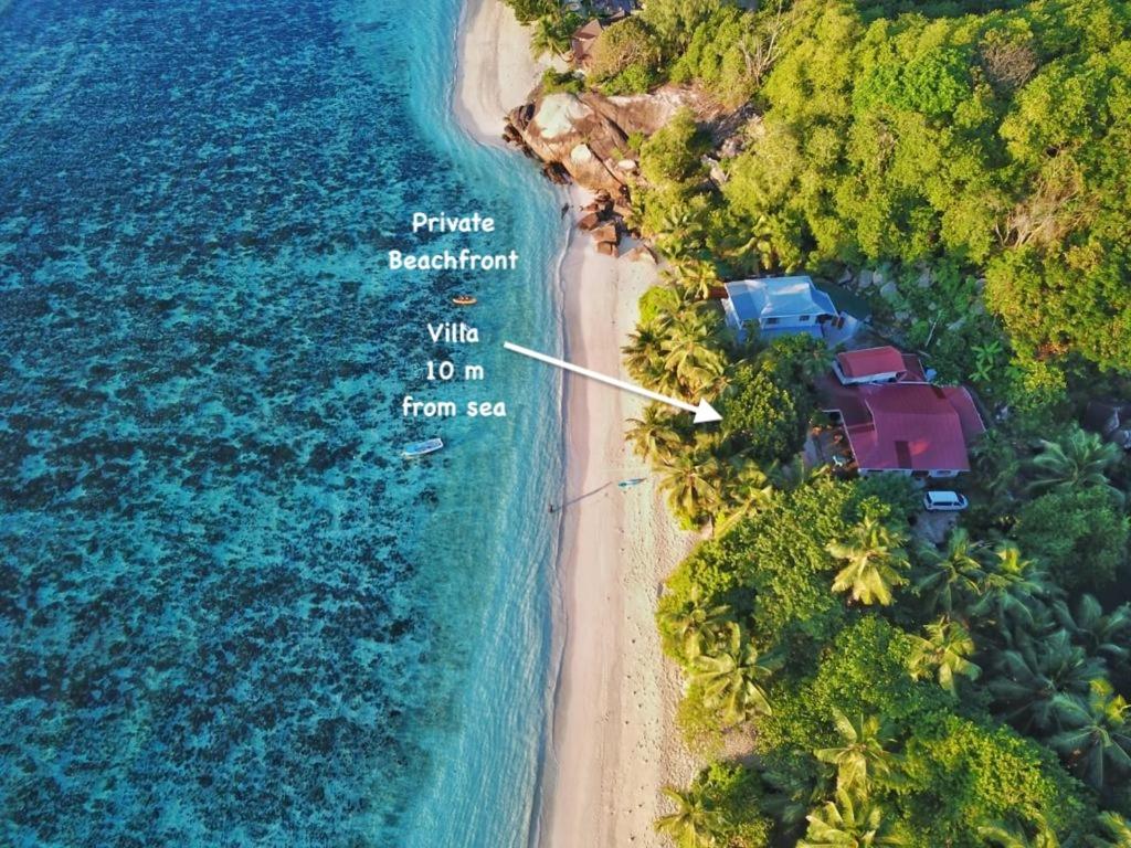 an aerial view of a house on a beach at Beach Kaz in Takamaka