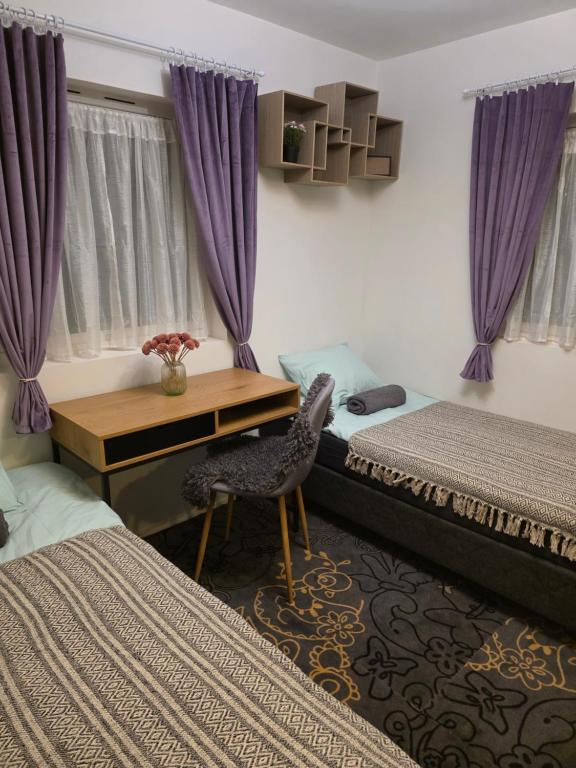 Ένα ή περισσότερα κρεβάτια σε δωμάτιο στο Nord Stay Tromso