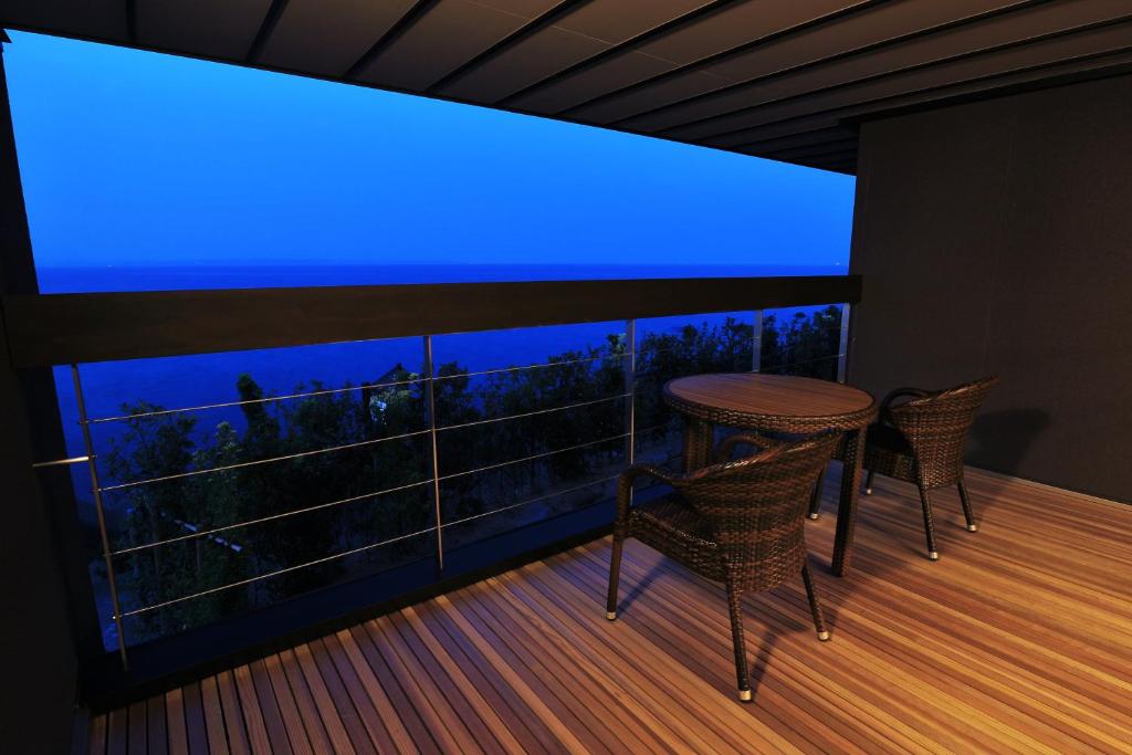 Balkón nebo terasa v ubytování AMANE resort GAHAMA