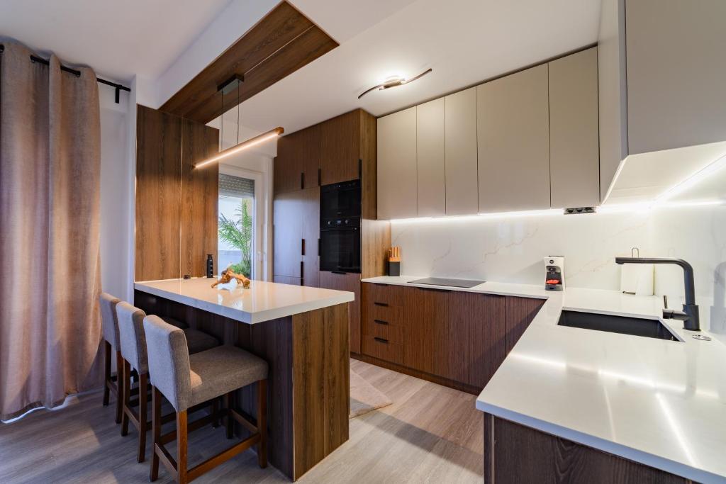 Kuchyň nebo kuchyňský kout v ubytování Sandev Apartments Mocha