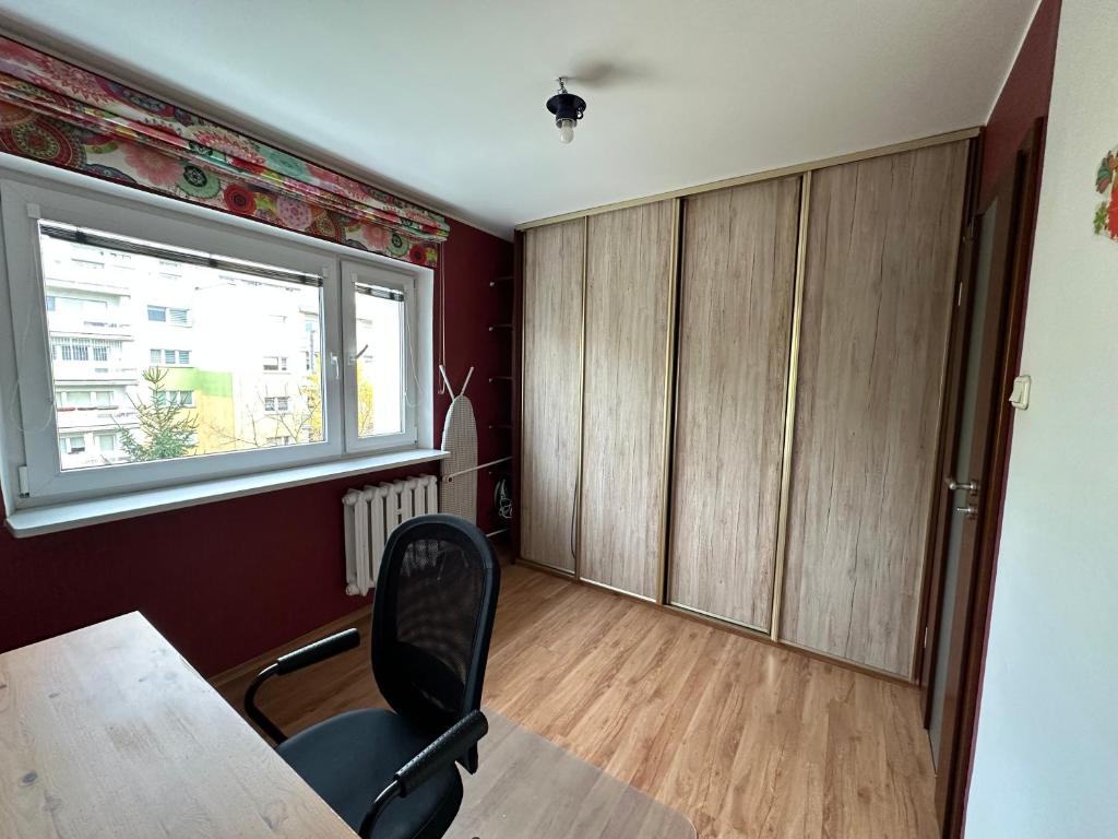 Χώρος καθιστικού στο Komfortowy apartament