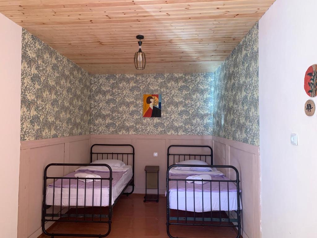 Ένα ή περισσότερα κρεβάτια σε δωμάτιο στο Vintage house Lantia