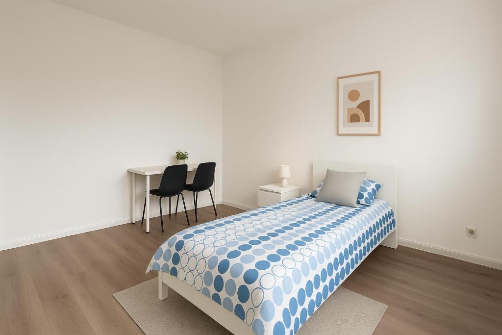 Postel nebo postele na pokoji v ubytování Monteur- und Ferienwohnung Viernheim