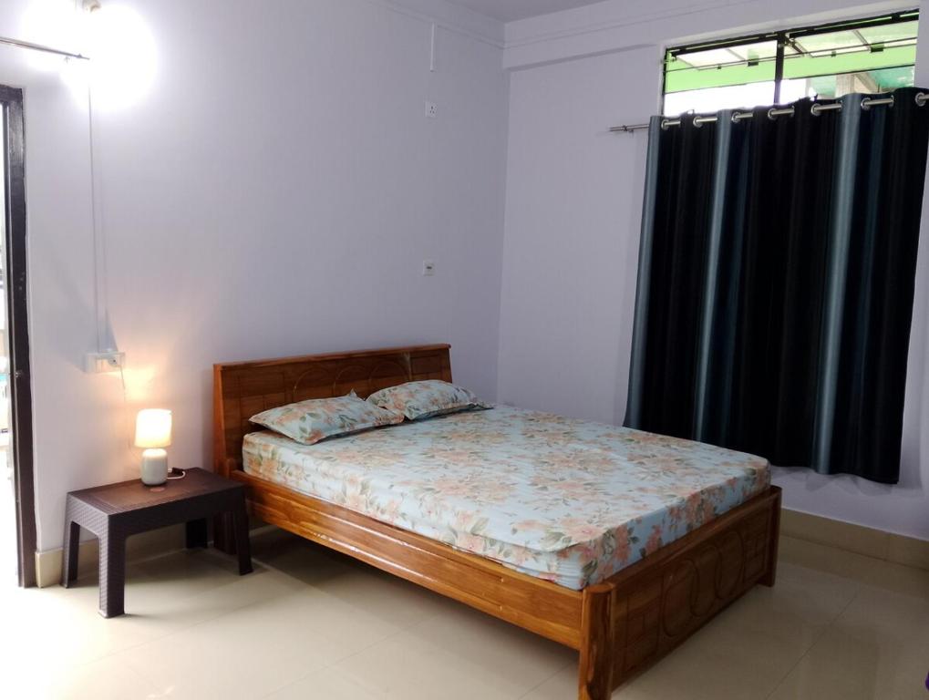 Postel nebo postele na pokoji v ubytování StudioStay at Ajem-Lar Homestay