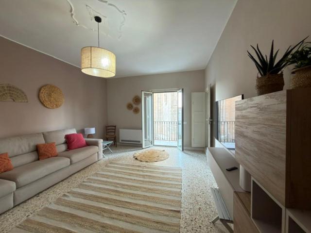 Postel nebo postele na pokoji v ubytování Casa Manbrù by Studio Vita