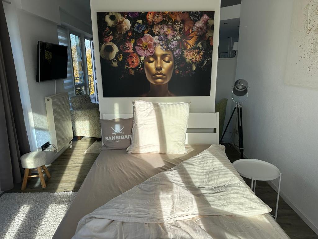 Ένα ή περισσότερα κρεβάτια σε δωμάτιο στο Penthous WaldOase am Naturschutzgebiet