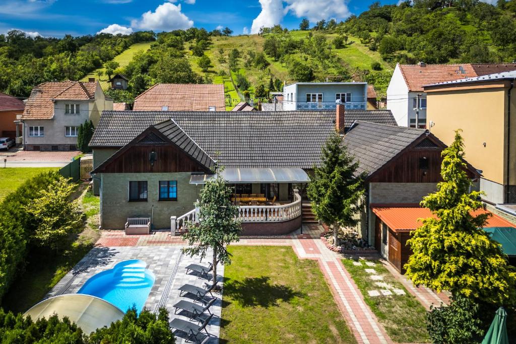 an aerial view of a house with a swimming pool at Chalupa Pod Starú horú in Bohuslavice