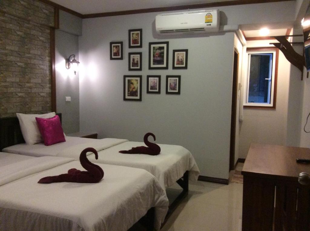 Postel nebo postele na pokoji v ubytování TR Guesthouse