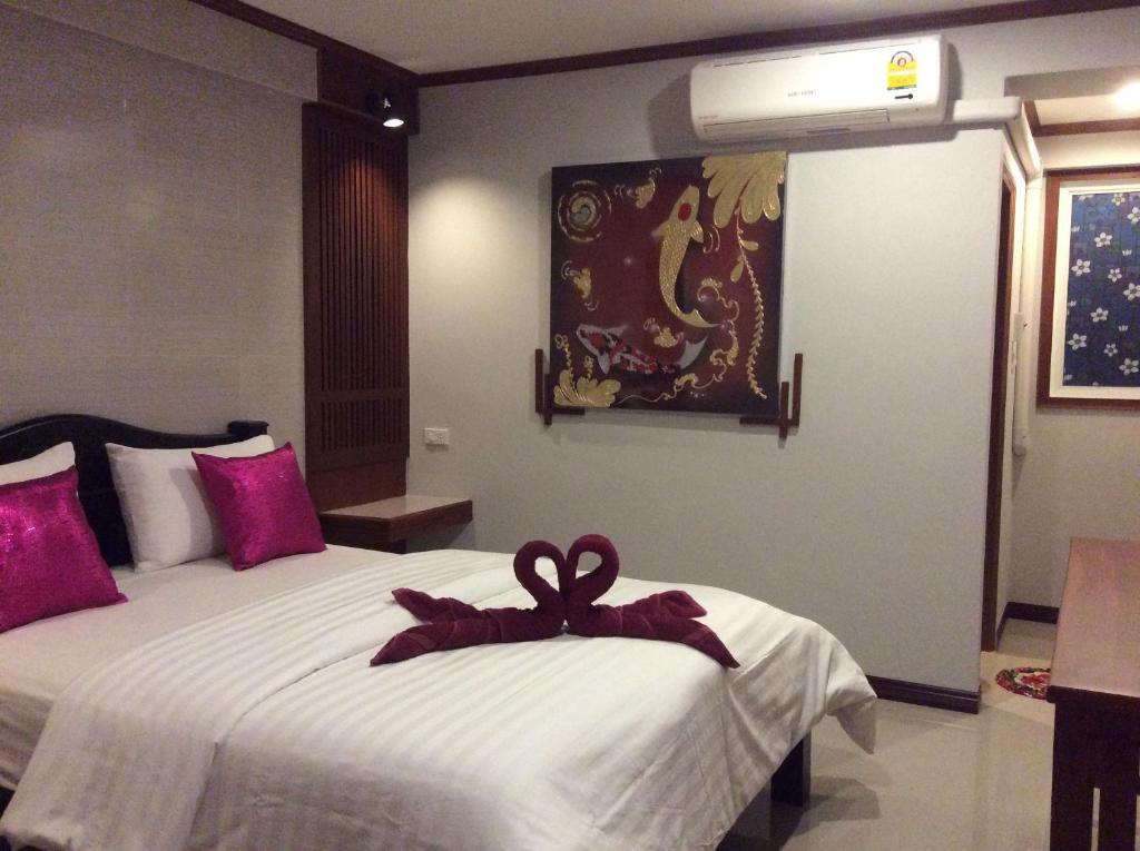 Postel nebo postele na pokoji v ubytování TR Guesthouse