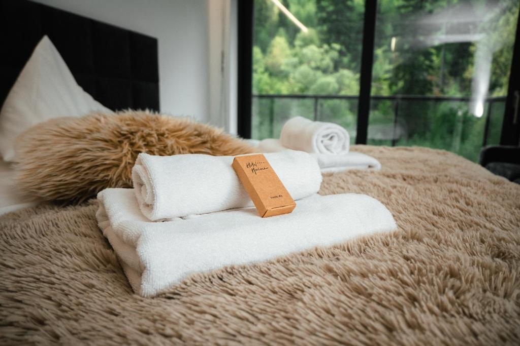 Llit o llits en una habitació de Hotel Marlene