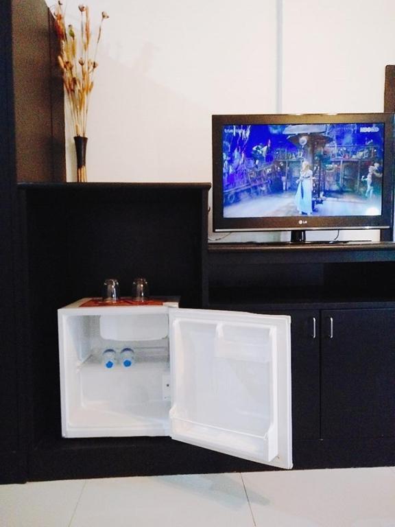 TV a/nebo společenská místnost v ubytování Boomerang Inn