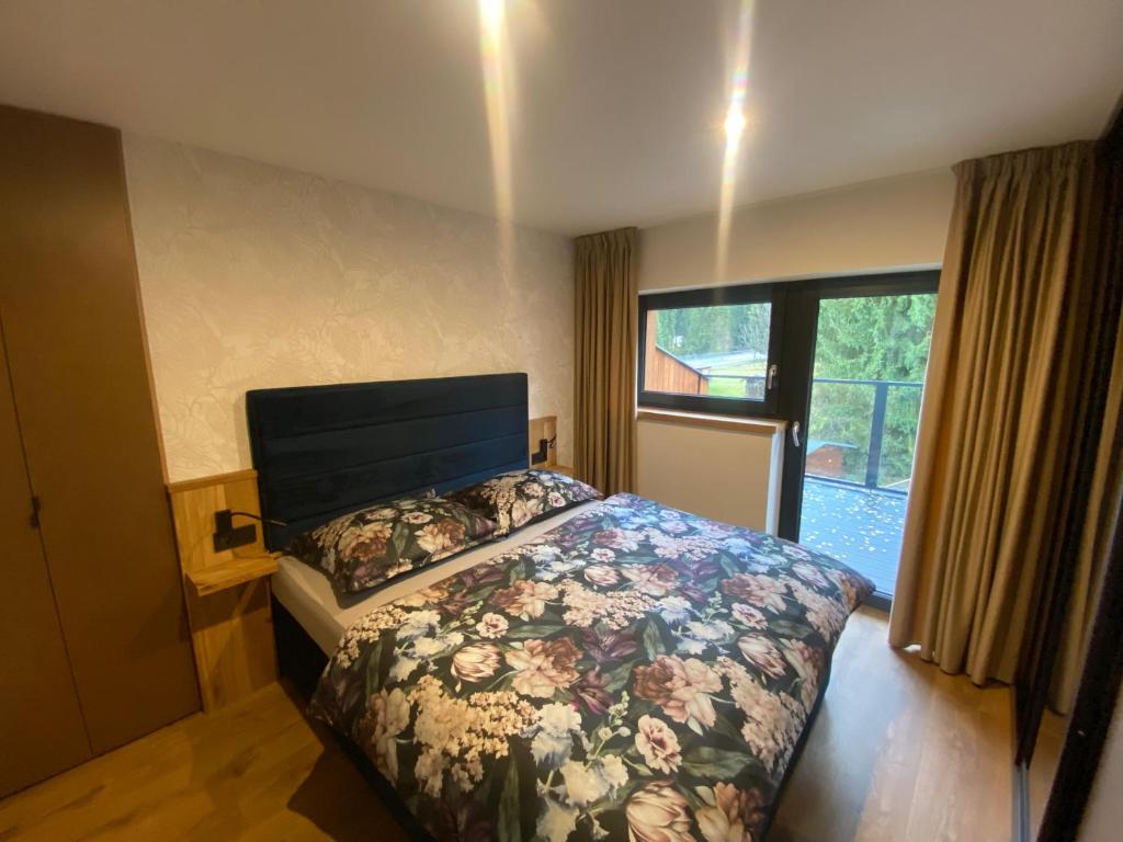 Postel nebo postele na pokoji v ubytování Apartmány La Torretta