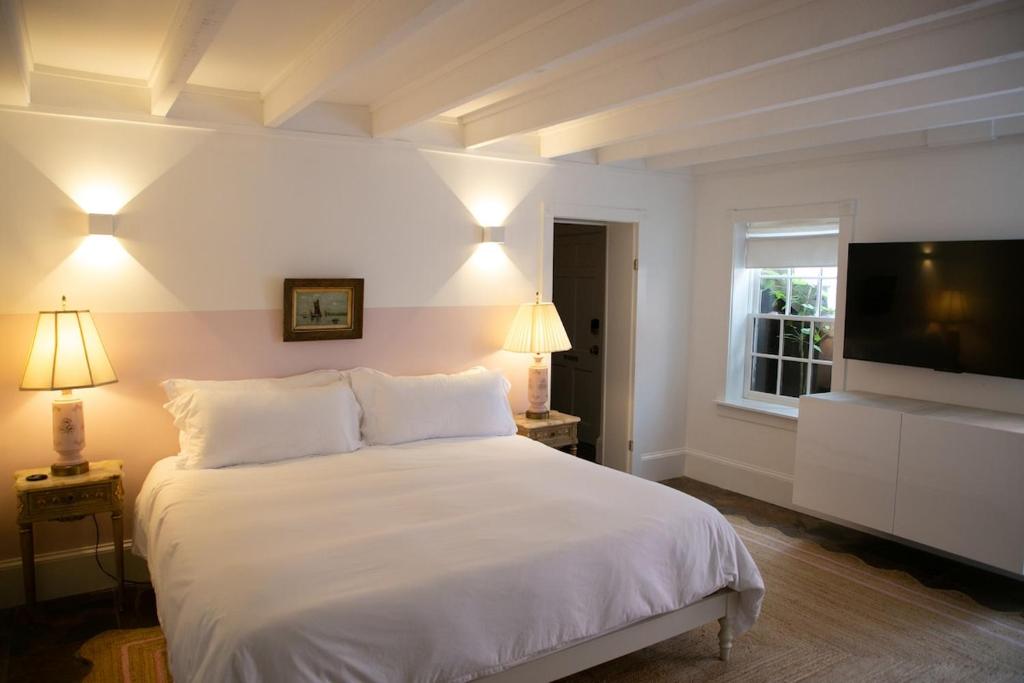 Ένα ή περισσότερα κρεβάτια σε δωμάτιο στο Bosch Huis Rosé Suite