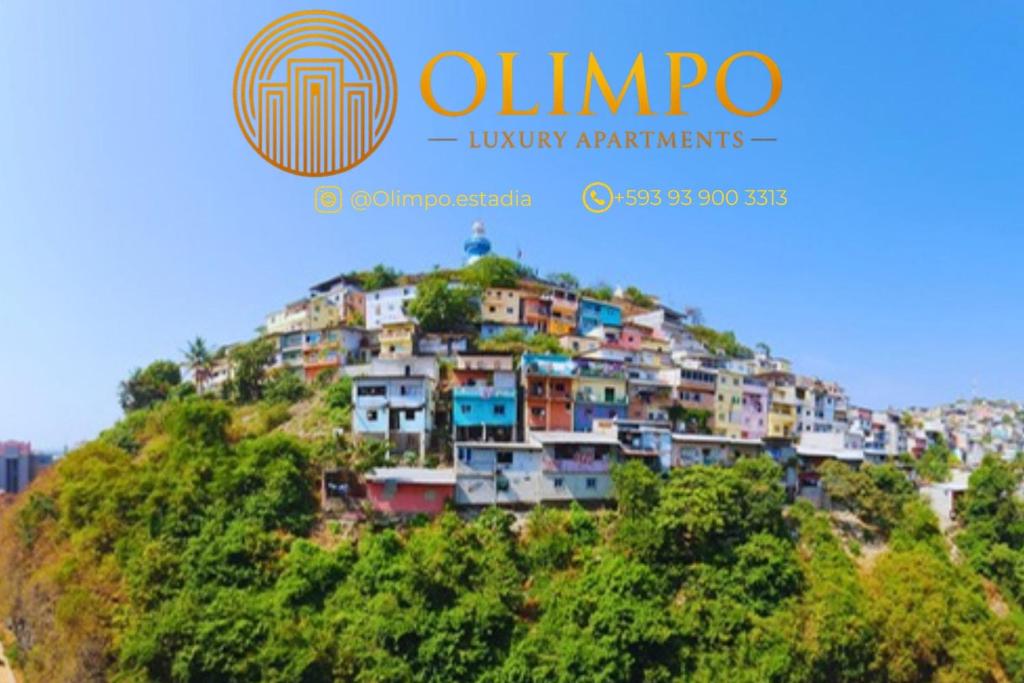 a view of a hill with houses on it at EcuOlimpo Lighthouse Stay double in Guayaquil