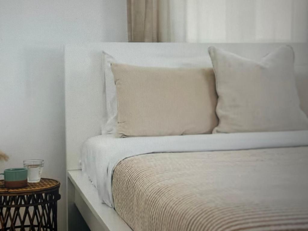 Ένα ή περισσότερα κρεβάτια σε δωμάτιο στο Amazing views in mykonos