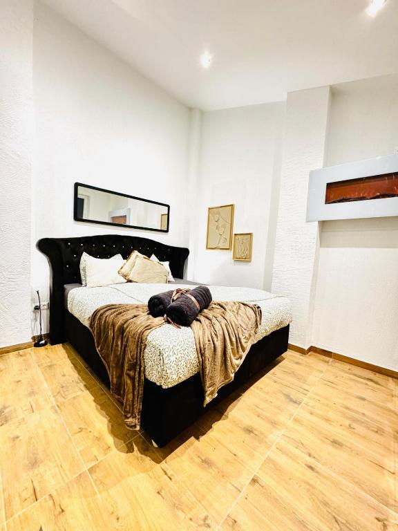 Postel nebo postele na pokoji v ubytování Modern Studio Apartment in Central Vienna