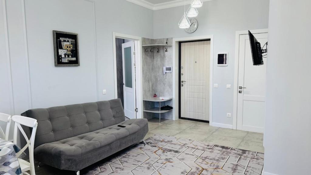 Χώρος καθιστικού στο Красивые апартаменты на ЭКСПО