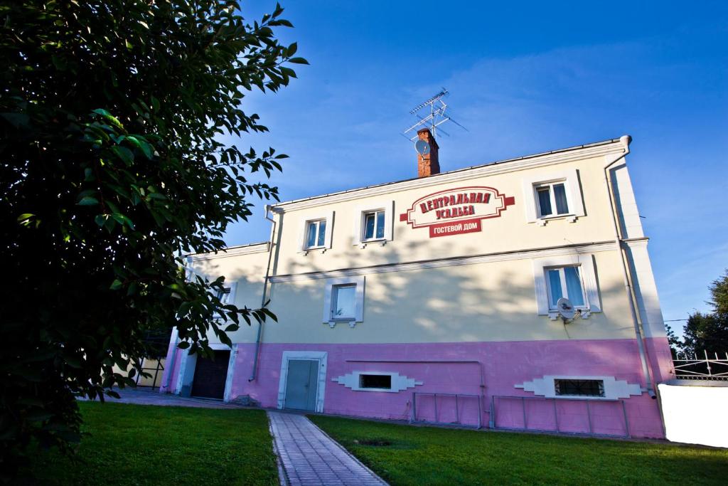 a building with a man on the top of it at Centralnaya Usadba in Kolomna