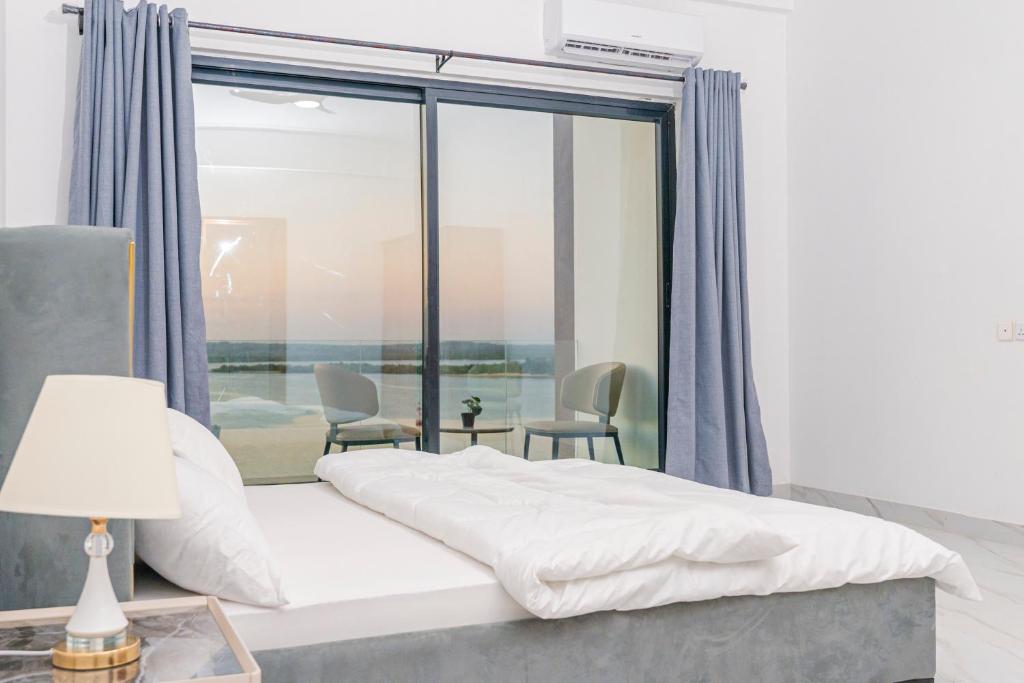 Ένα ή περισσότερα κρεβάτια σε δωμάτιο στο Sweet Apartment