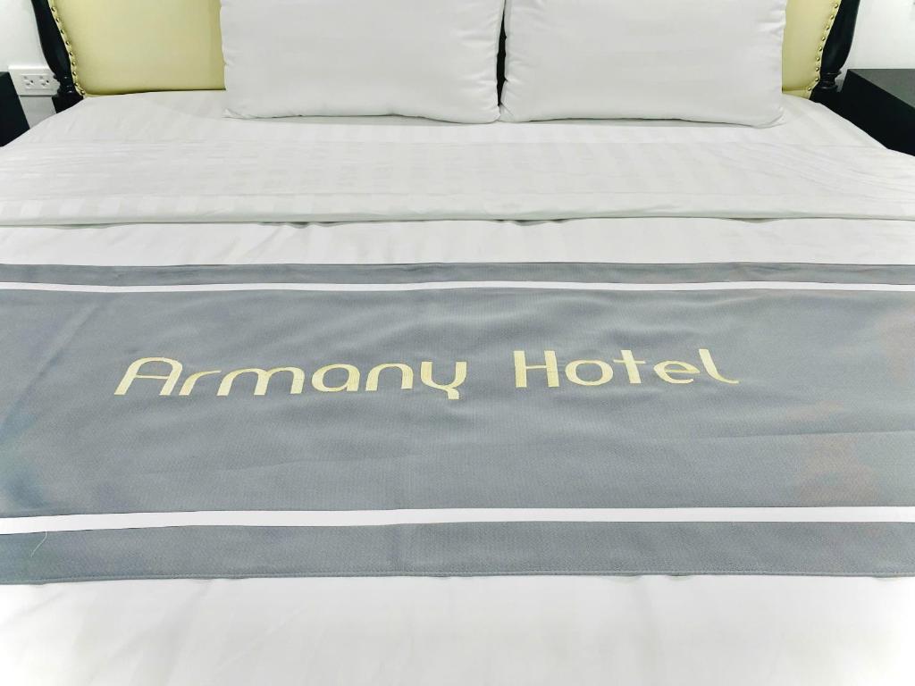 a bed with a rambany hotel written on it at Tam Coc Armany Hotel & Sky Restaurant in Vũ Lâm