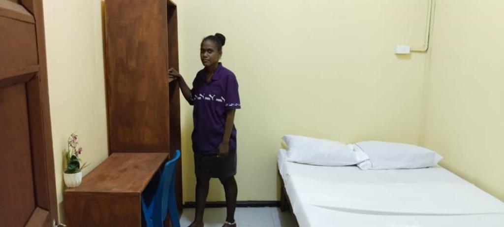 Postel nebo postele na pokoji v ubytování Airport Transit Haus