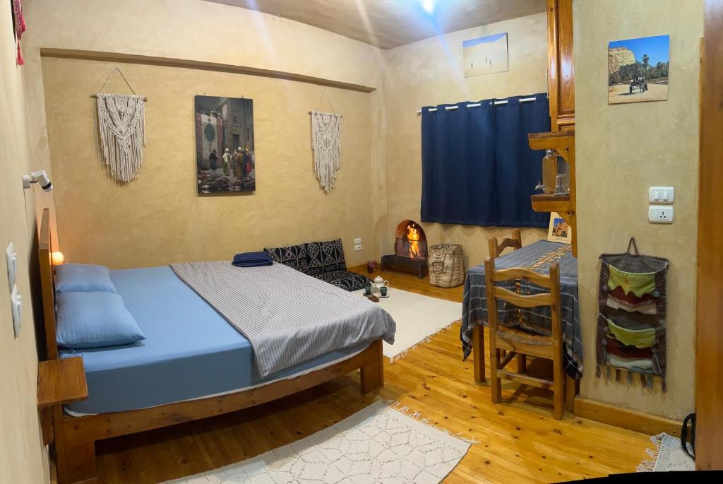 Postel nebo postele na pokoji v ubytování Spellbound in Siwa