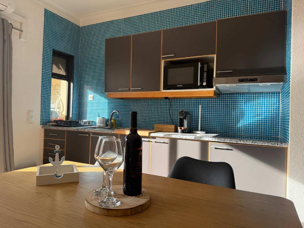 Kuchyň nebo kuchyňský kout v ubytování Stunning one bedroom apartment in the heart of Praia da Rocha