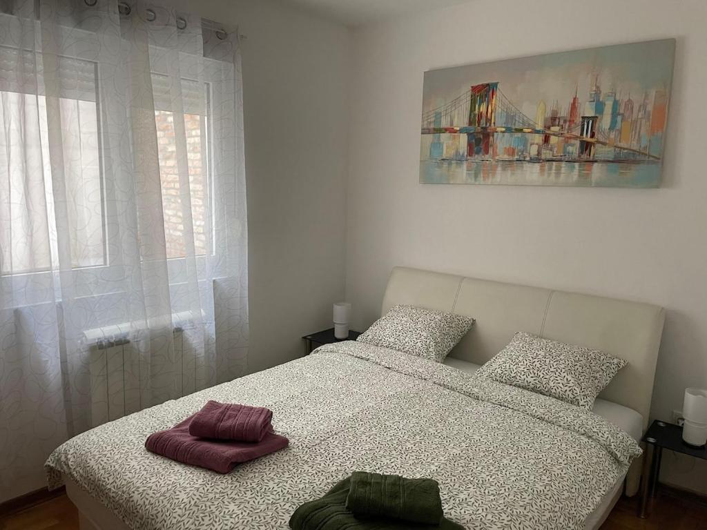 Ένα ή περισσότερα κρεβάτια σε δωμάτιο στο Spice Apartment