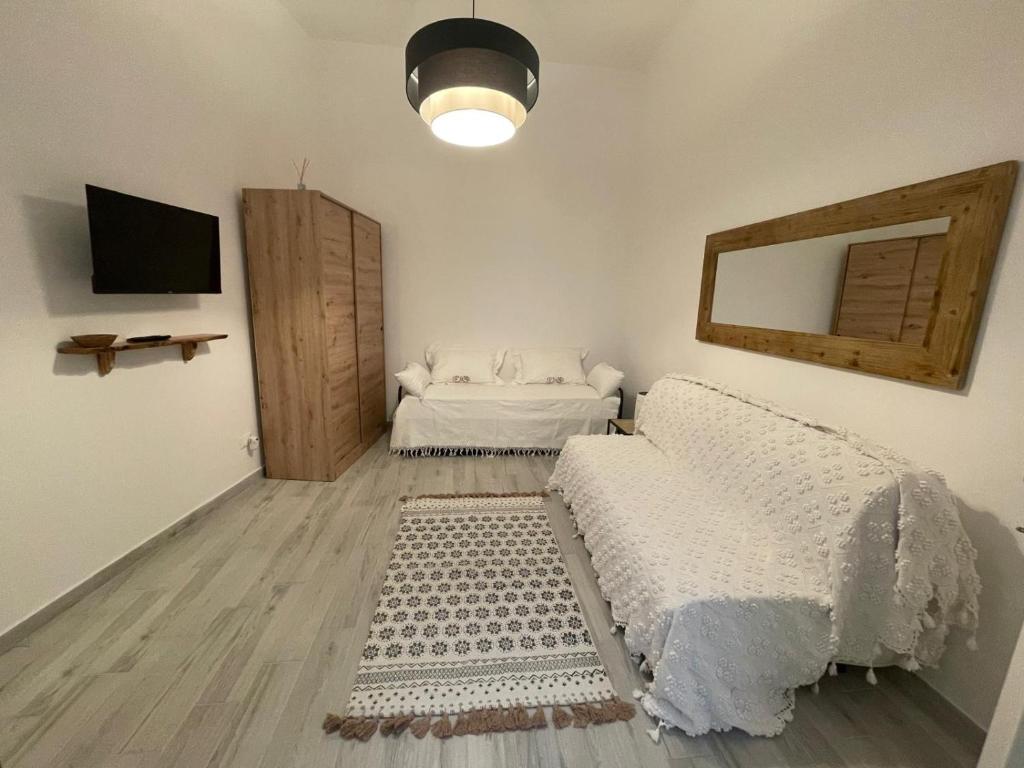 Postel nebo postele na pokoji v ubytování Casa Margherita