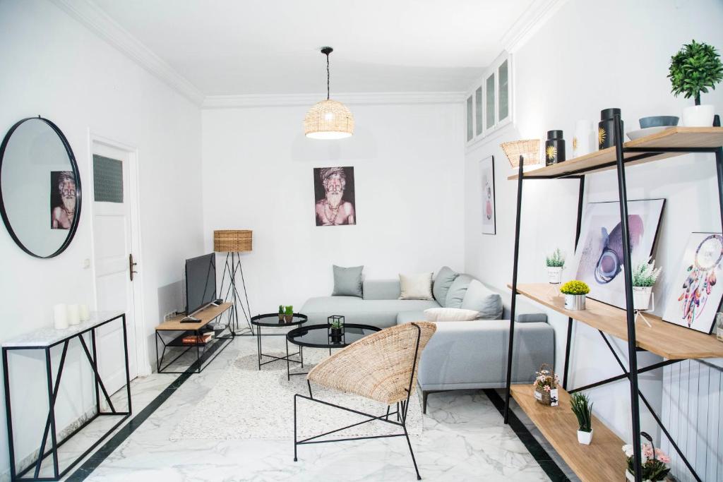Posezení v ubytování Appartement moderne face au parc la Marsa
