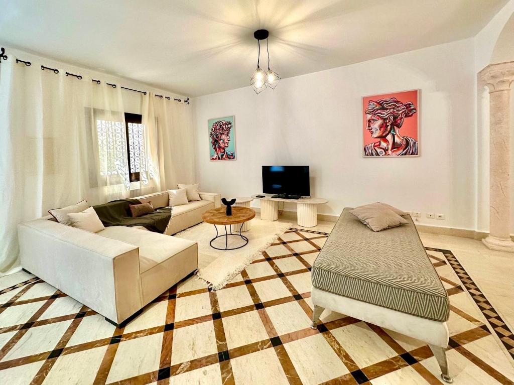 Posezení v ubytování Golden Tulip spacious 1 bedroom with terraces