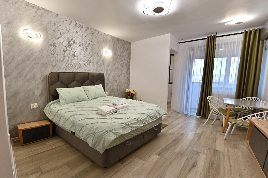 Ένα ή περισσότερα κρεβάτια σε δωμάτιο στο Sofia Luxury Studio