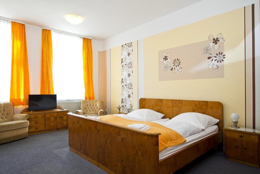 Postel nebo postele na pokoji v ubytování Hotel Neun 3/4