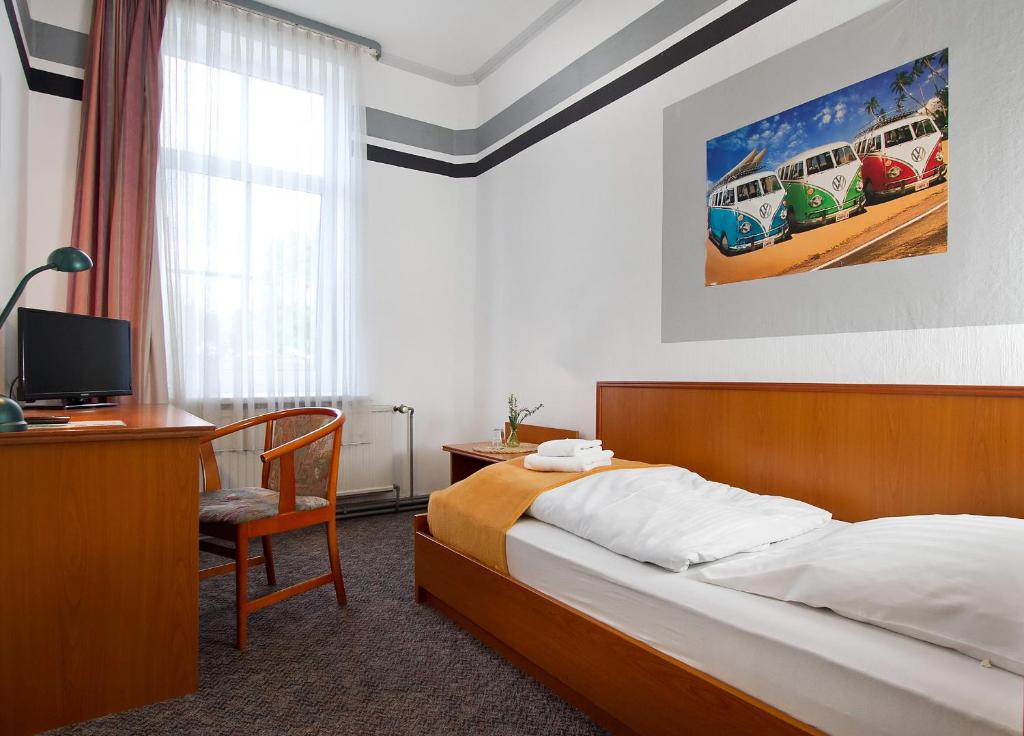 Postel nebo postele na pokoji v ubytování Hotel Neun 3/4
