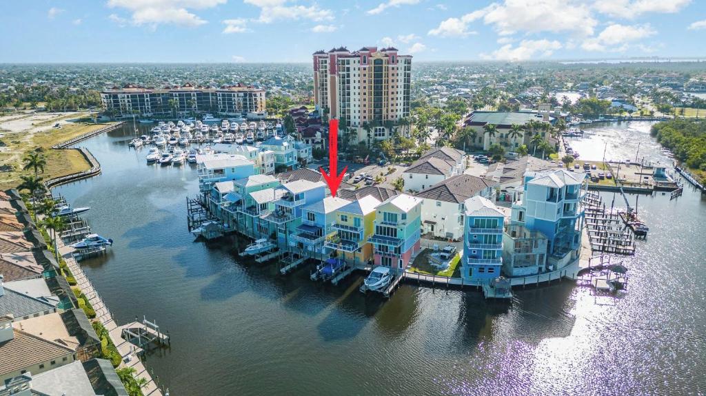 an aerial view of a marina with boats in the water at Funky Fish House Villa in Shell Point Village