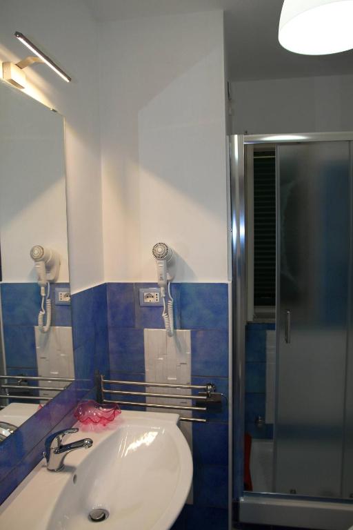 a bathroom with a sink and a mirror at Belvedere in Procida