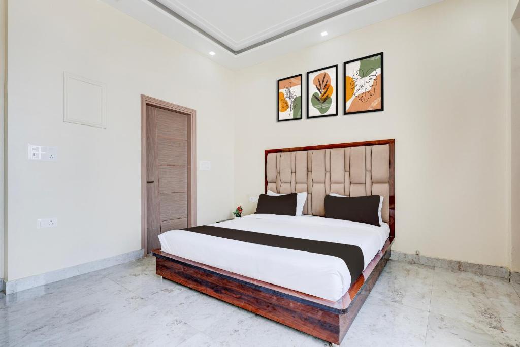 Postel nebo postele na pokoji v ubytování Super Hotel O BAL GOPAL