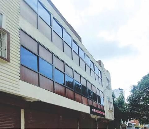 a building with many windows on the side of it at Hotel A K CONTINENTAL in Rānchī