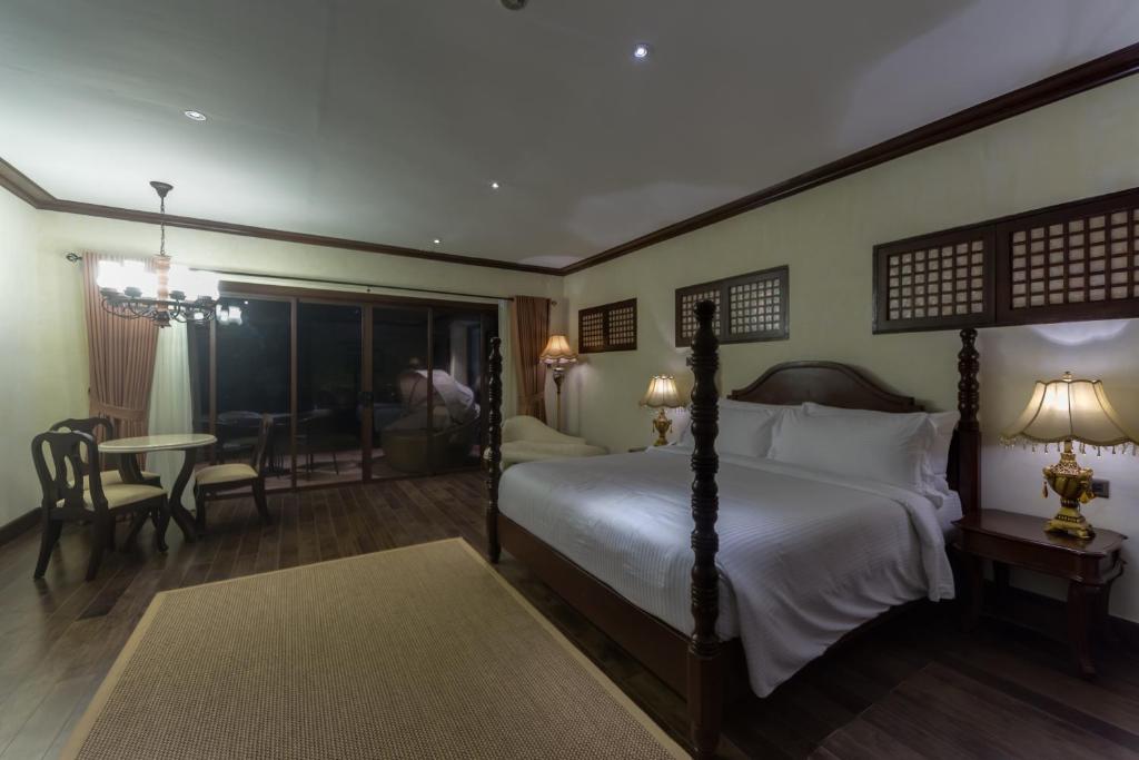 Postel nebo postele na pokoji v ubytování Espacio Verde Resort