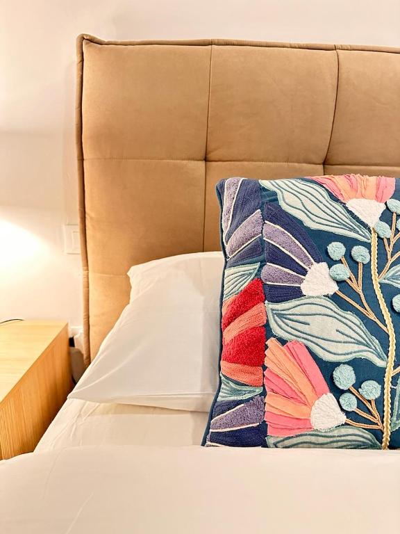 Ένα ή περισσότερα κρεβάτια σε δωμάτιο στο La Corte di Angelico