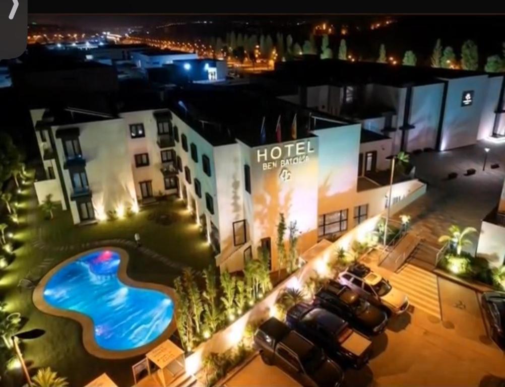 an aerial view of a hotel at night at Hotel Ben Batouta - Tanger in Tangier