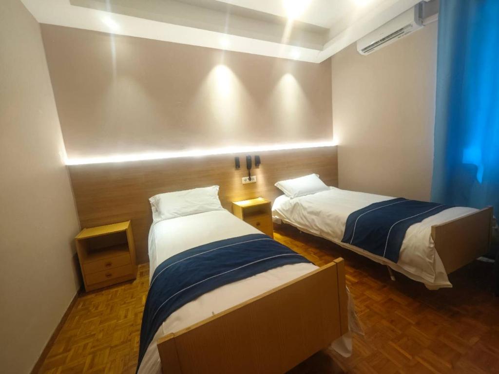 Postel nebo postele na pokoji v ubytování Hotel Ristorante Oro