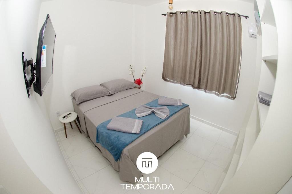 Телевизор и/или развлекательный центр в Apto Nantes com Vista pro Beto Carrero World