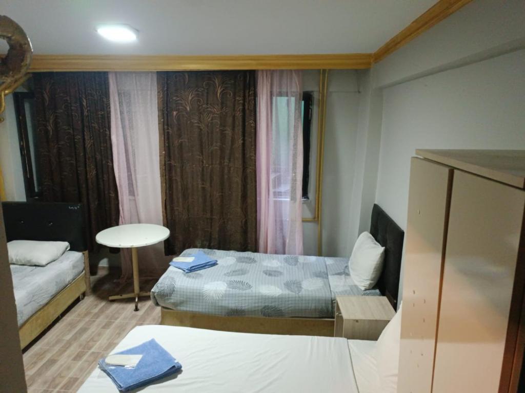 Cama o camas de una habitación en Suite Hotel