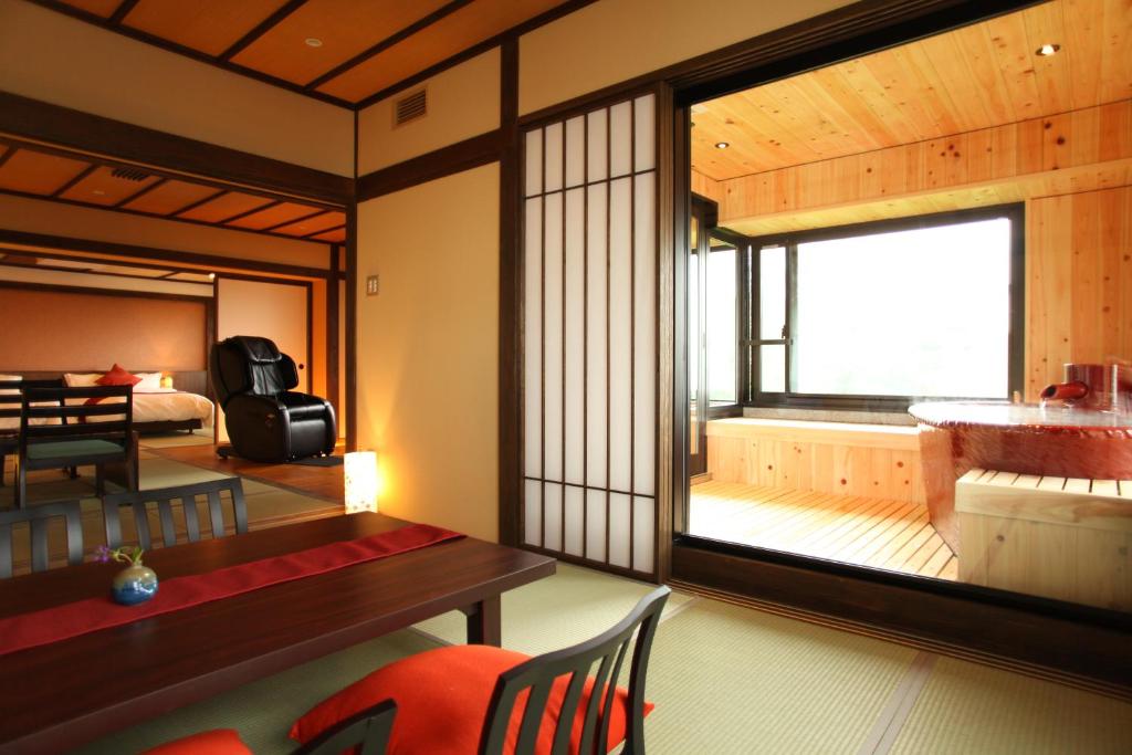 Postel nebo postele na pokoji v ubytování Hotel Higashidate