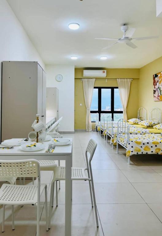 Ένα ή περισσότερα κρεβάτια σε δωμάτιο στο Edusphere Suites, Cyberjaya